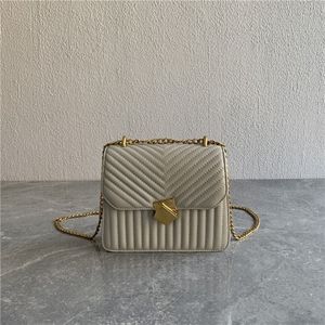 Lamb skin flap bag in cream with gold chain